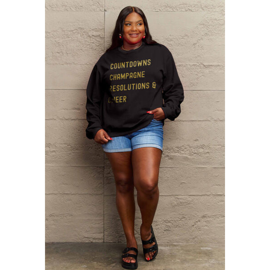 Simply Love Full Size COUNTDOWNS CHAMPAGNE RESOLUTIONS &amp; CHEER Round Neck Sweatshirt Apparel and Accessories