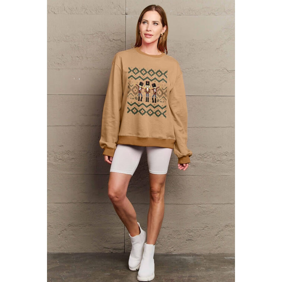 Simply Love Full Size Nutcracker Graphic Long Sleeve Sweatshirt Camel / S Women’s Fashion Clothing
