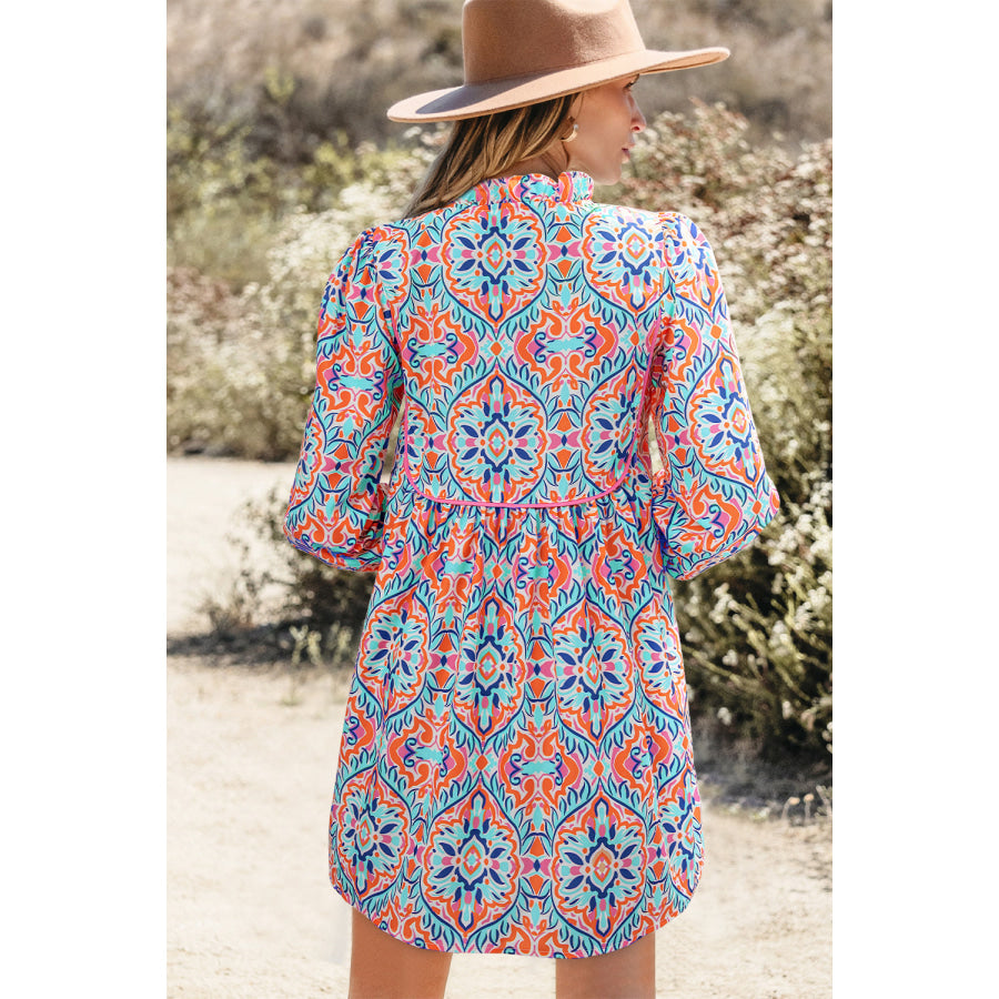 Sky Blue Abstract Printed Long Sleeve Tied Neckline Mini Dress Dresses/Mini Dresses