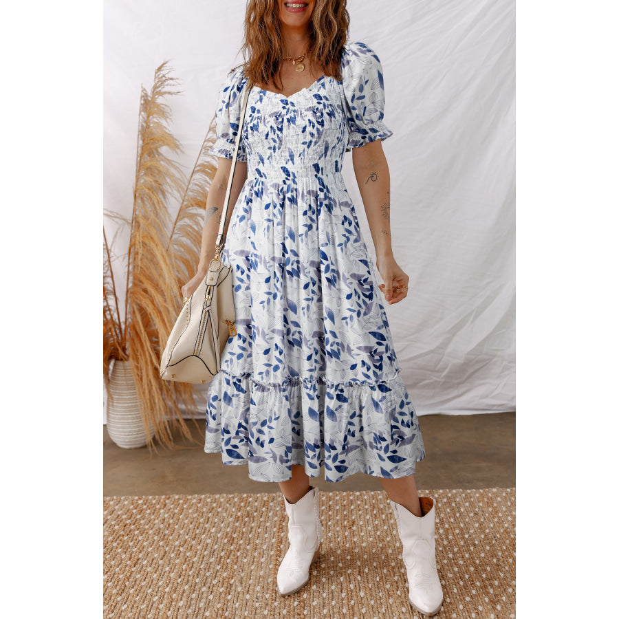 Sky Blue Smocked Bodice Short Puff Sleeve Tiered Floral Midi Dress Sky Blue / S / 100% Viscose Dresses/Floral Dresses