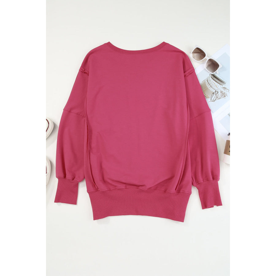 Slit Exposed Seam Round Neck Sweatshirt Apparel and Accessories