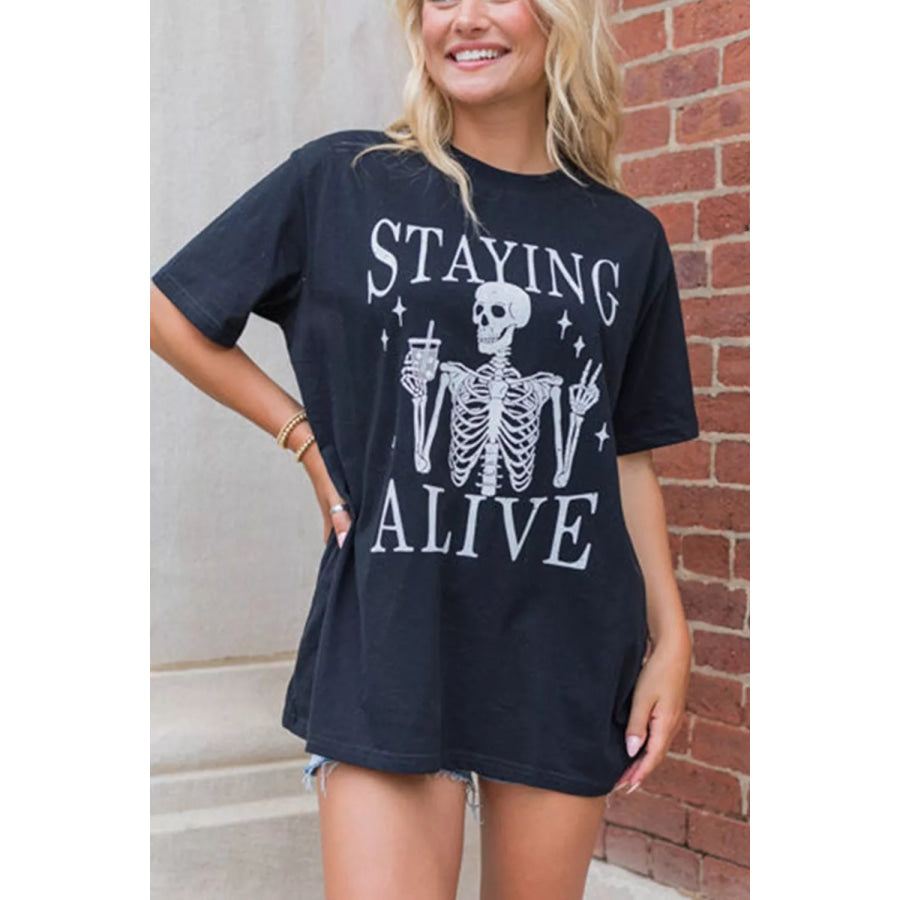 STAYING ALIVE Funny Skeleton Graphic Round Neck T Shirt Apparel and Accessories