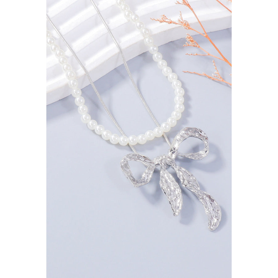 Synthetic Pearl Necklace Bow Necklace and Bow Earrings Jewelry Set Silver / One Size Apparel and Accessories