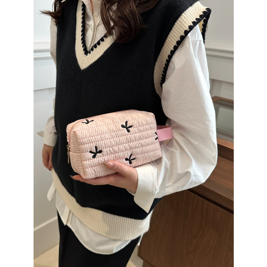 Texture Contrast Bow Wristlet Blush Pink / One Size Apparel and Accessories