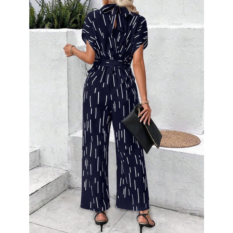 Tied Printed Mock Neck Wide Leg Jumpsuit Dark Navy / S Apparel and Accessories