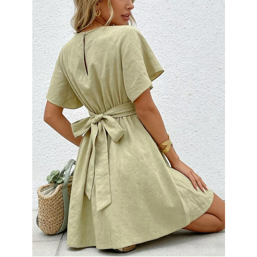 Twist Waist Flutter Sleeve Mini Dress Apparel and Accessories