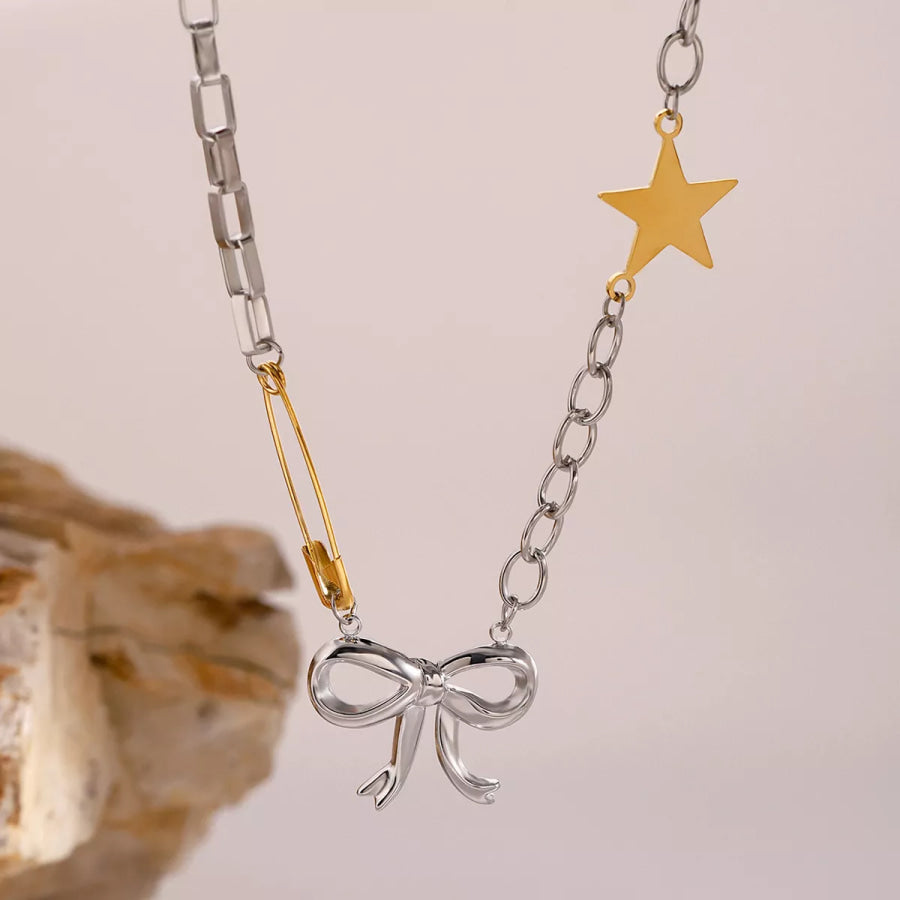 Two-Tone Bow Star Necklace Silver / One Size Apparel and Accessories