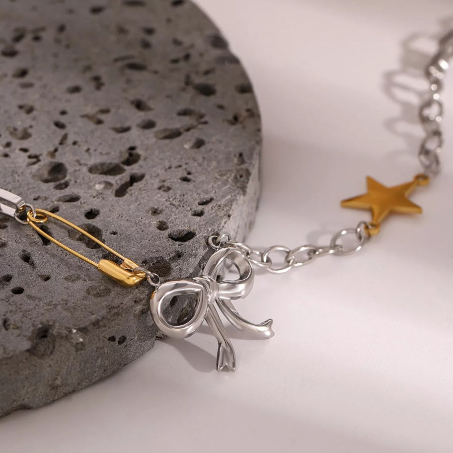 Two-Tone Bow Star Necklace Silver / One Size Apparel and Accessories