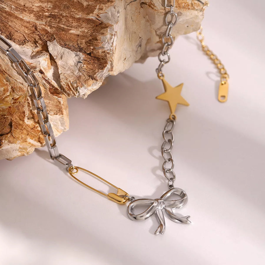 Two-Tone Bow Star Necklace Silver / One Size Apparel and Accessories
