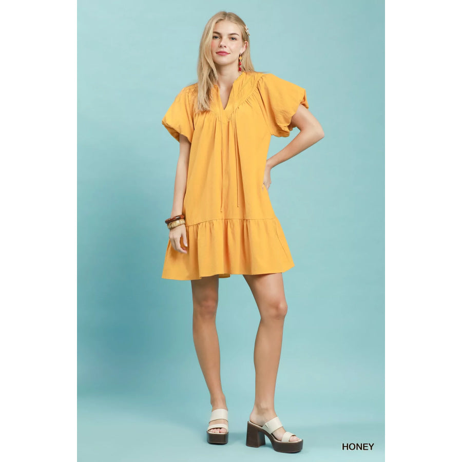 Umgee Flutter Sleeve Tassel Tie Ruffle Hem Mini Dress Apparel and Accessories