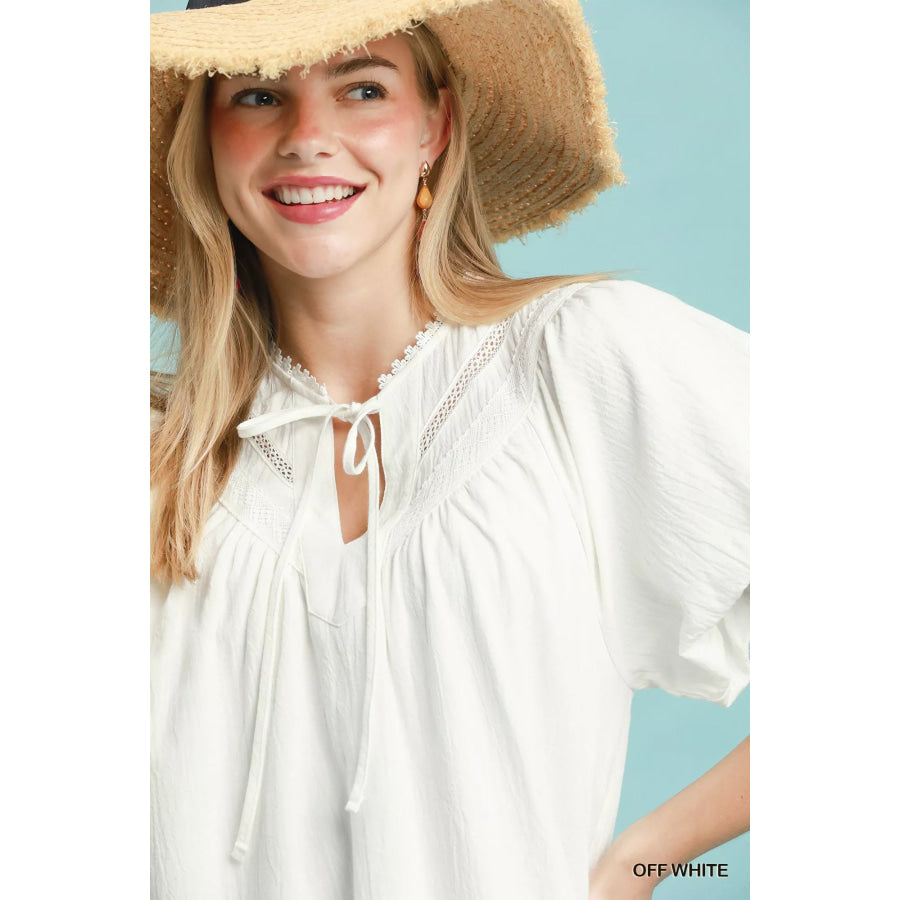 Umgee Flutter Sleeve Tassel Tie Ruffle Hem Mini Dress Apparel and Accessories