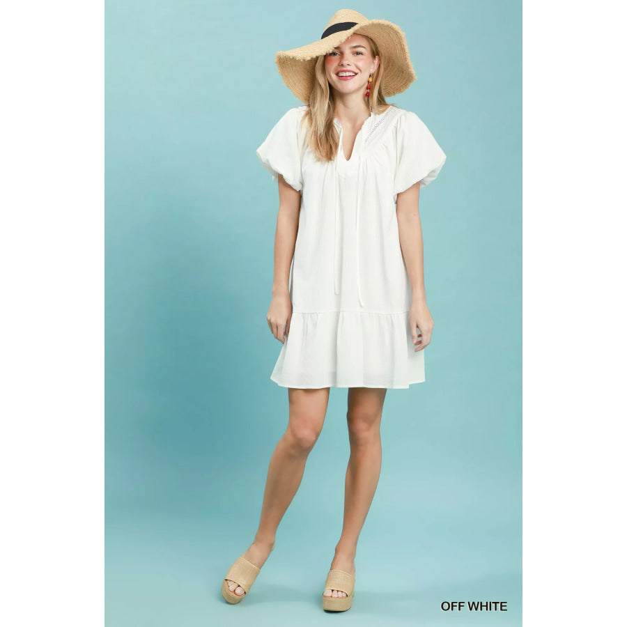 Umgee Flutter Sleeve Tassel Tie Ruffle Hem Mini Dress Apparel and Accessories