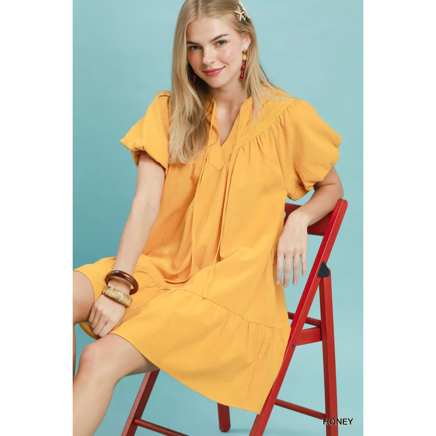 Umgee Flutter Sleeve Tassel Tie Ruffle Hem Mini Dress Apparel and Accessories