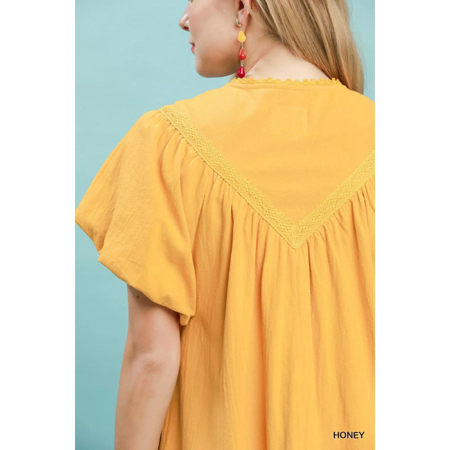 Umgee Flutter Sleeve Tassel Tie Ruffle Hem Mini Dress Apparel and Accessories