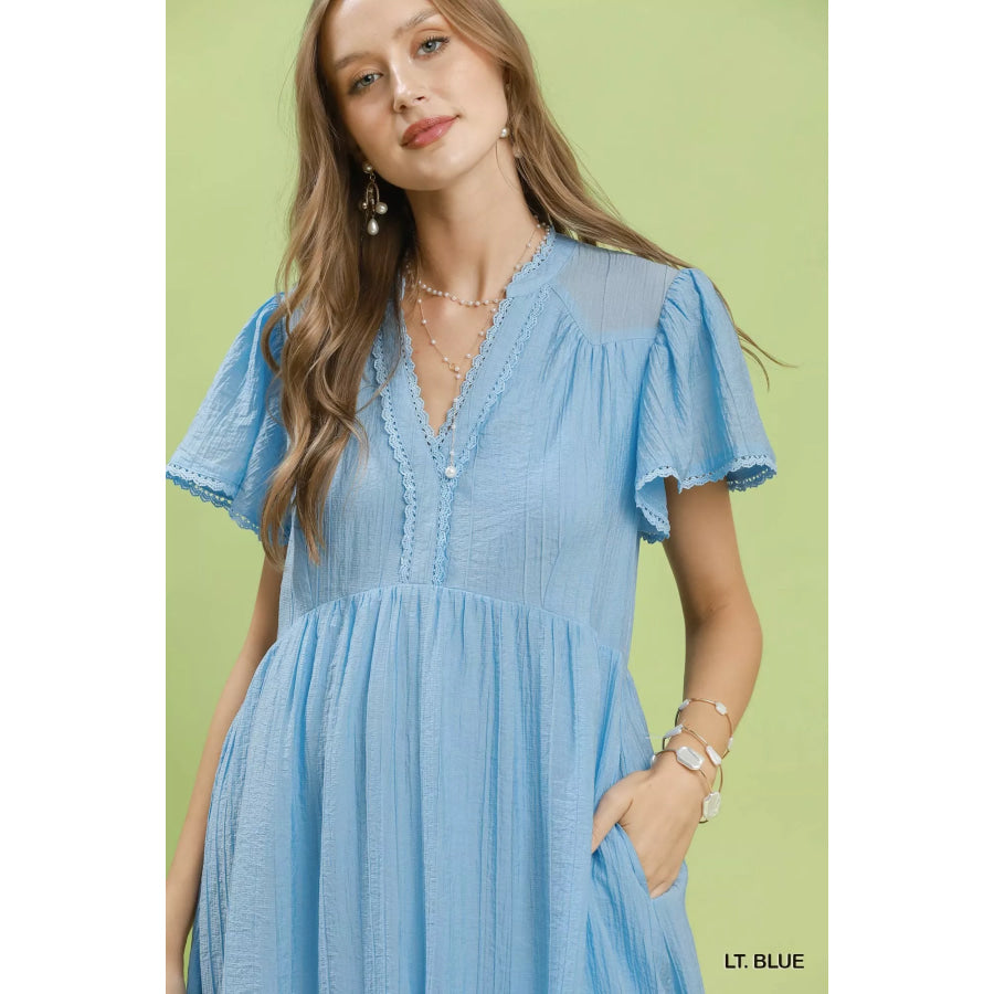 Umgee Textured Tiered Midi Dress with Side Pockets Apparel and Accessories