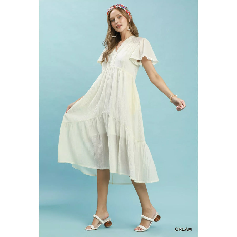 Umgee Textured Tiered Midi Dress with Side Pockets Apparel and Accessories