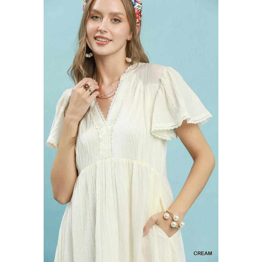Umgee Textured Tiered Midi Dress with Side Pockets Apparel and Accessories