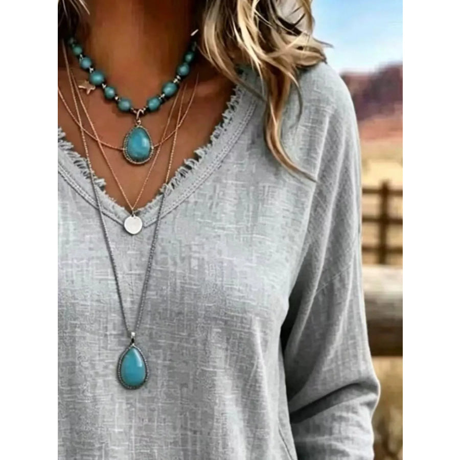 V-Neck Long Sleeve Blouse with Frayed Hem Detail Apparel and Accessories