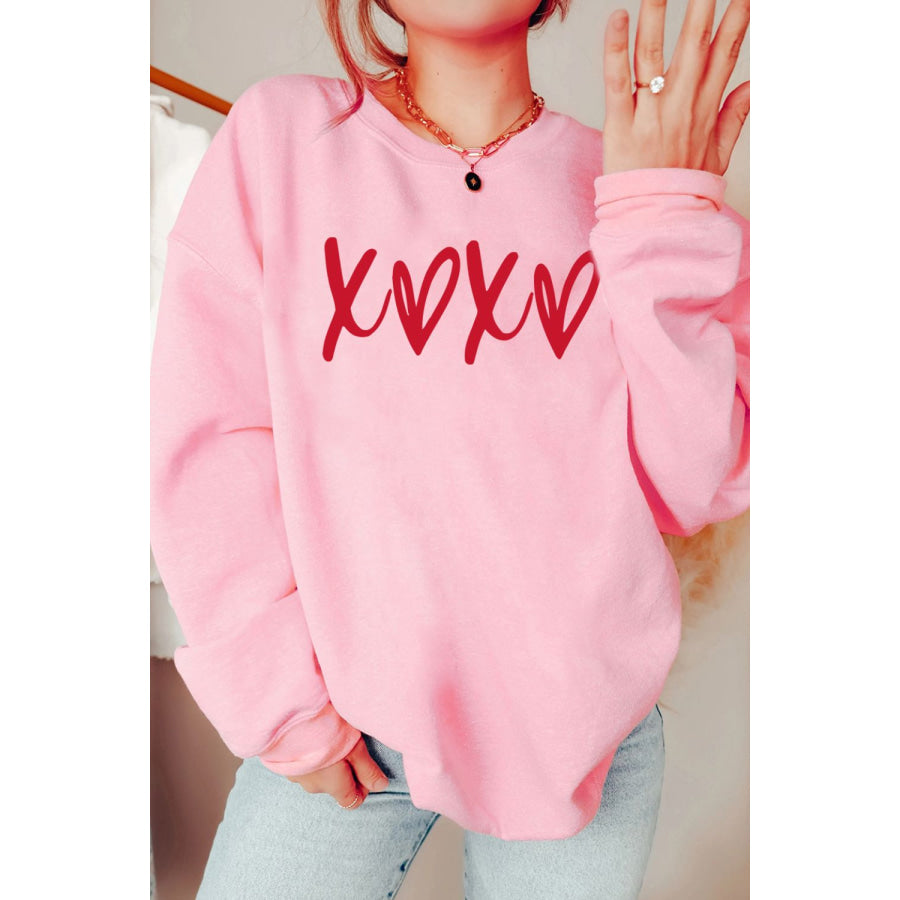 Valentine’s Day XOXO Round Neck Drop Shoulder Sweatshirt Blush Pink / S Apparel and Accessories